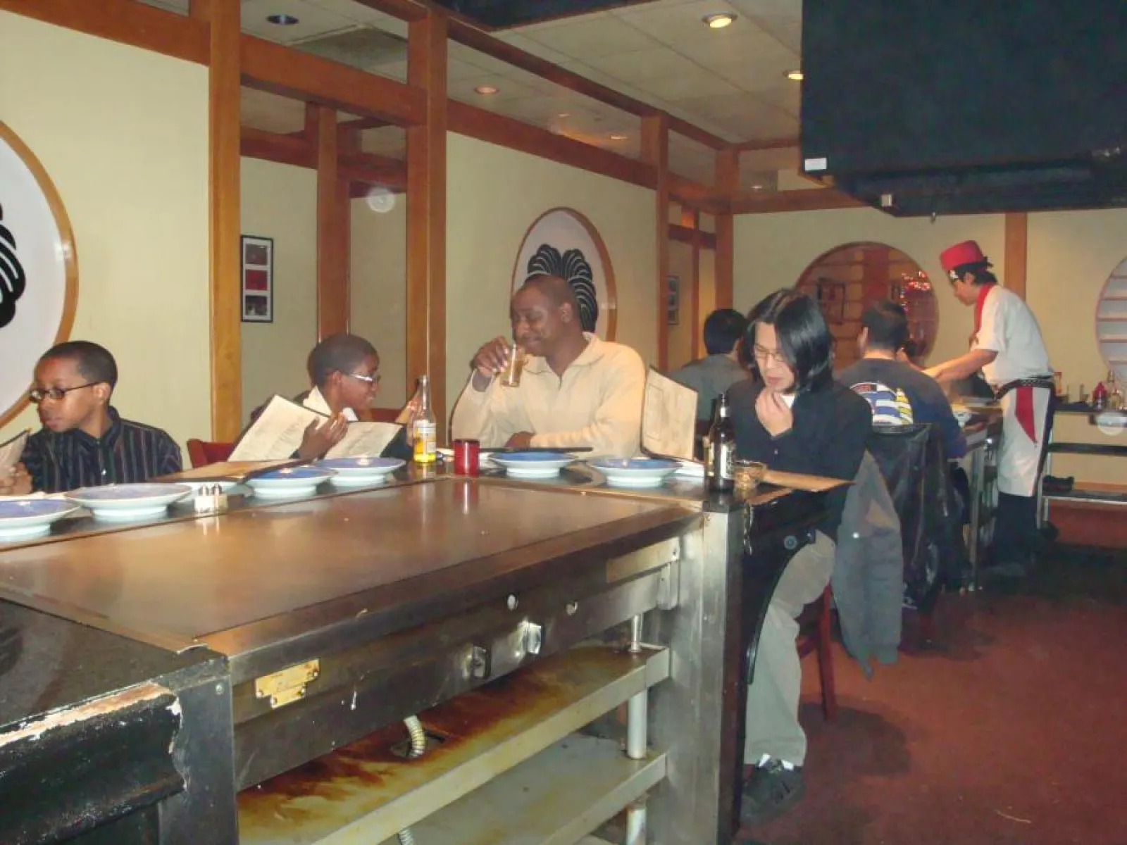 a group of people sitting at a table