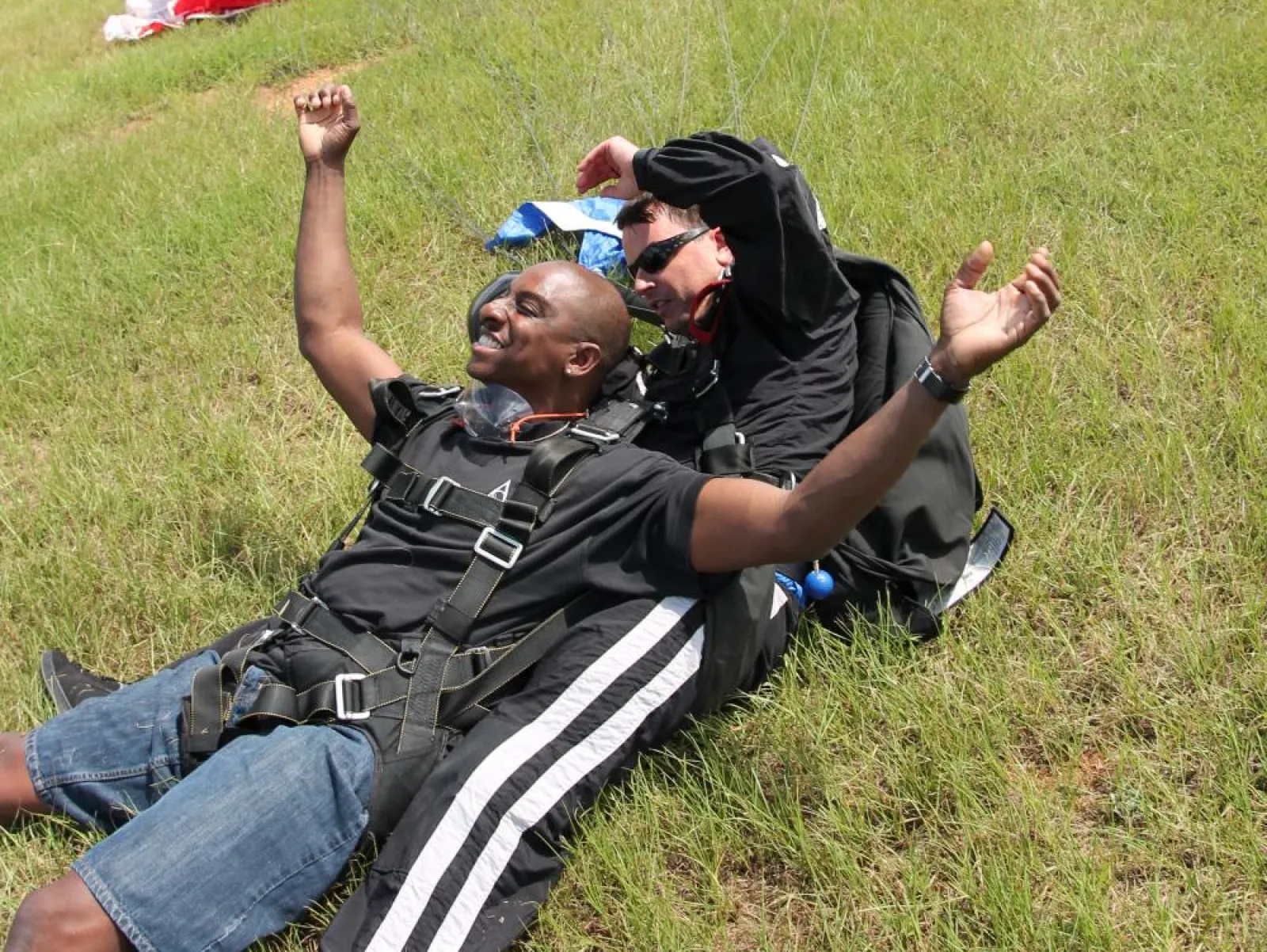 two people who just landed on the ground