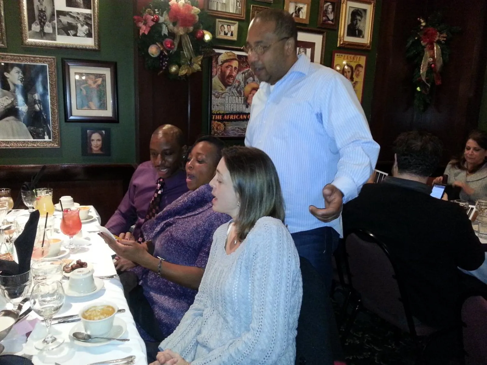 a group of people sitting at a table