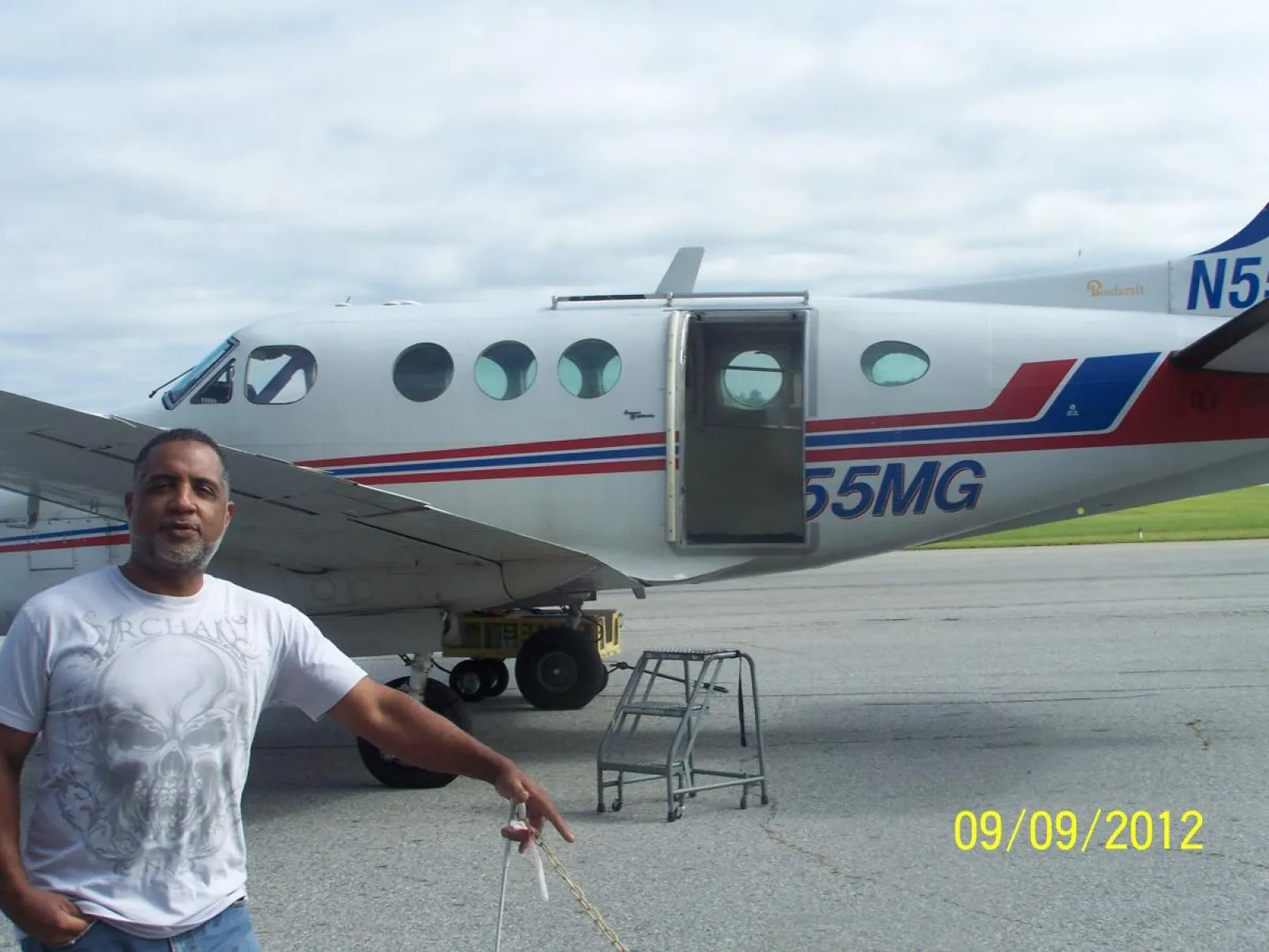 Martin standing next to a plane