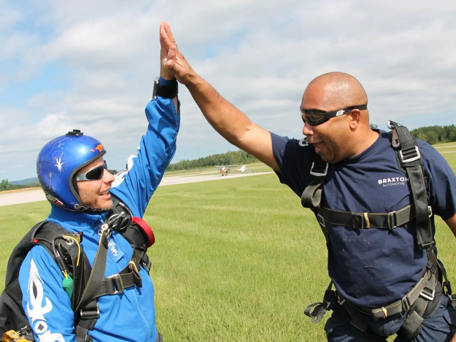 two people high-fiving