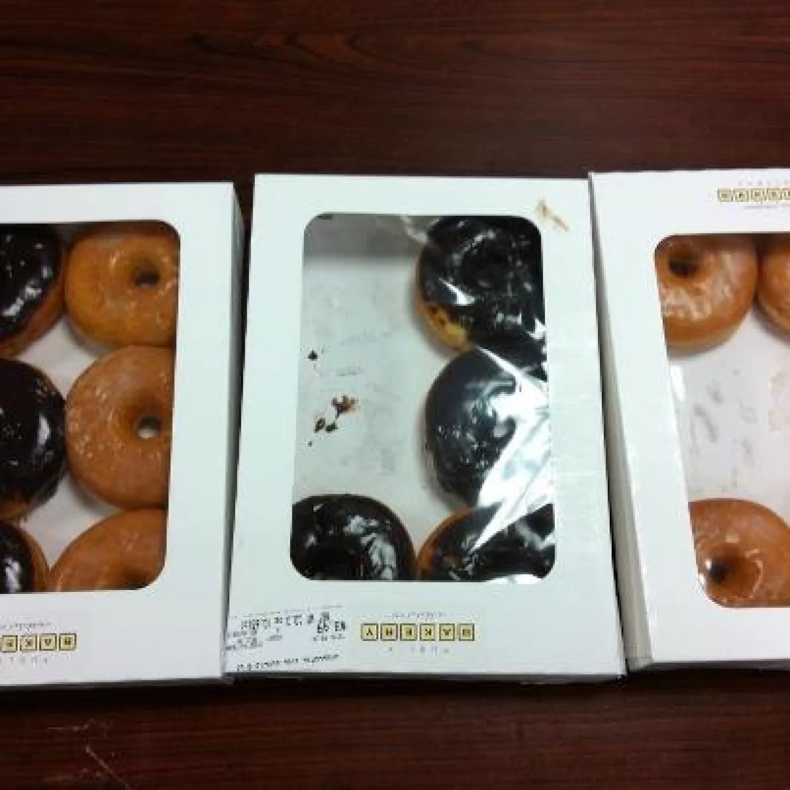 a box filled with different kinds of donuts