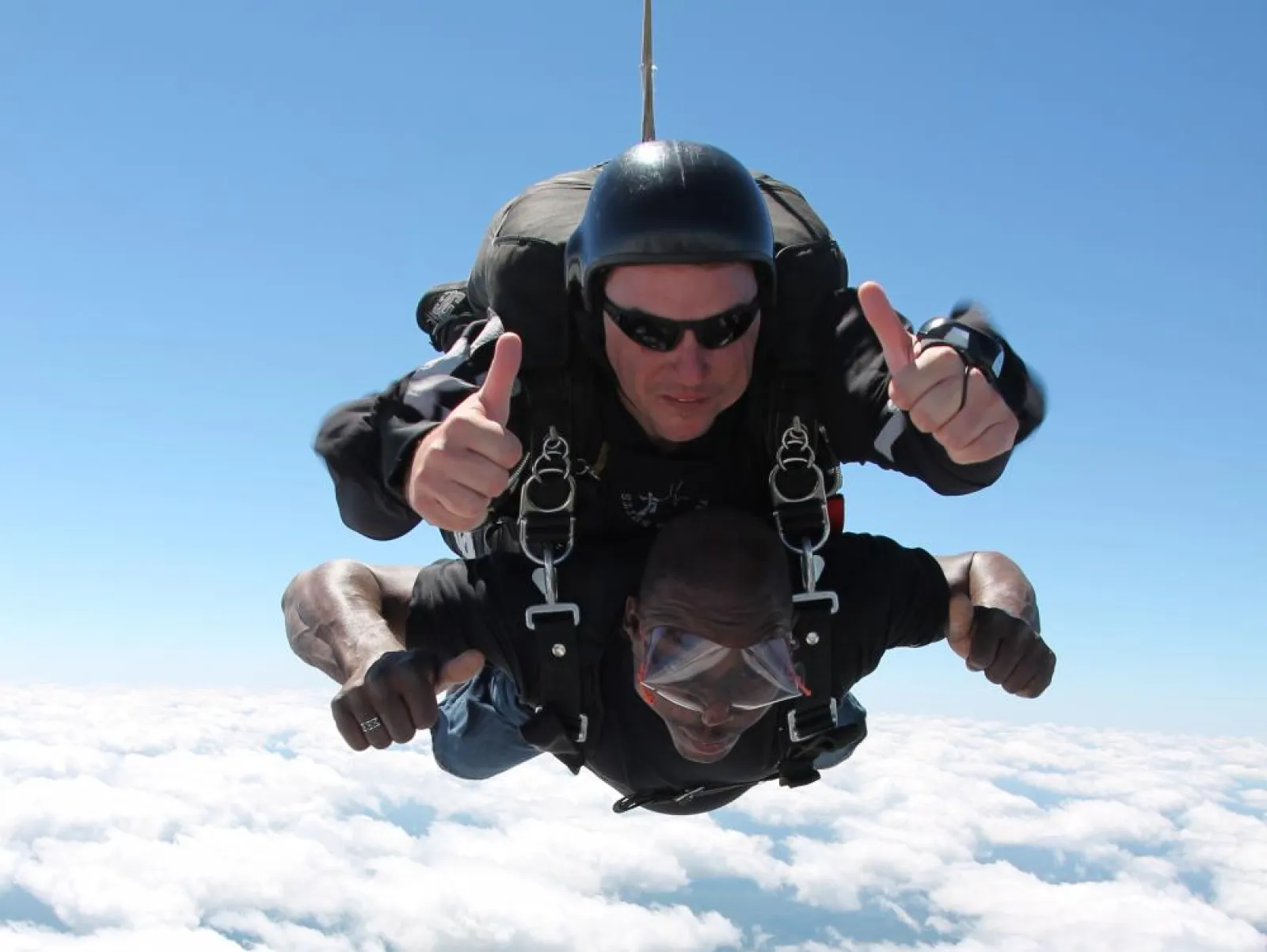 two people sky diving