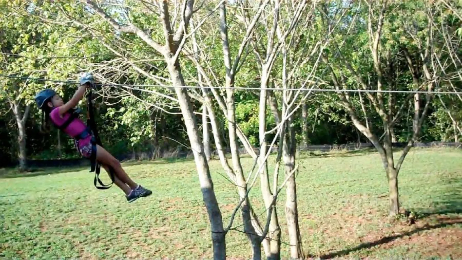 a person on a zip-line