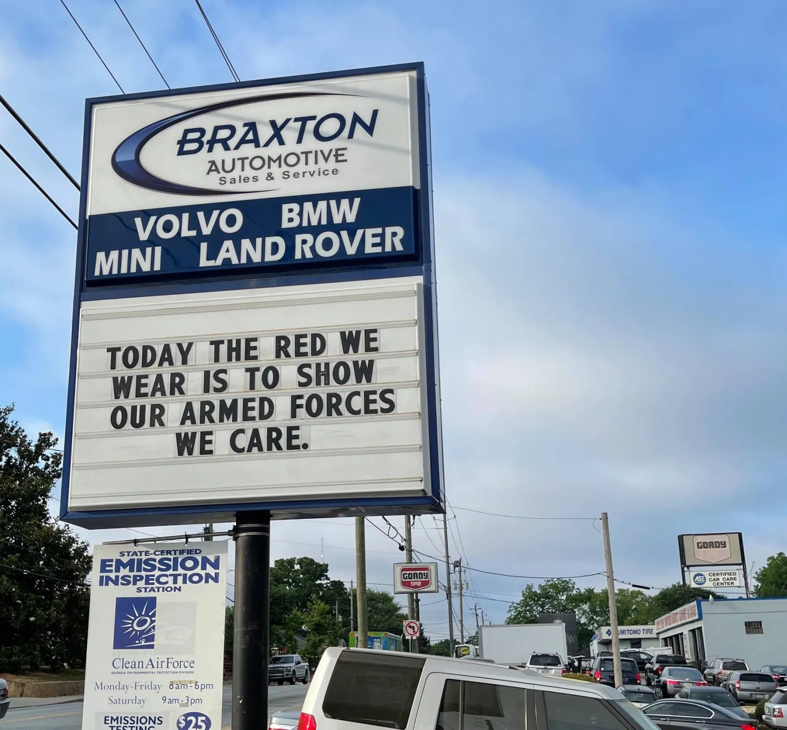 a sign on the side of a road