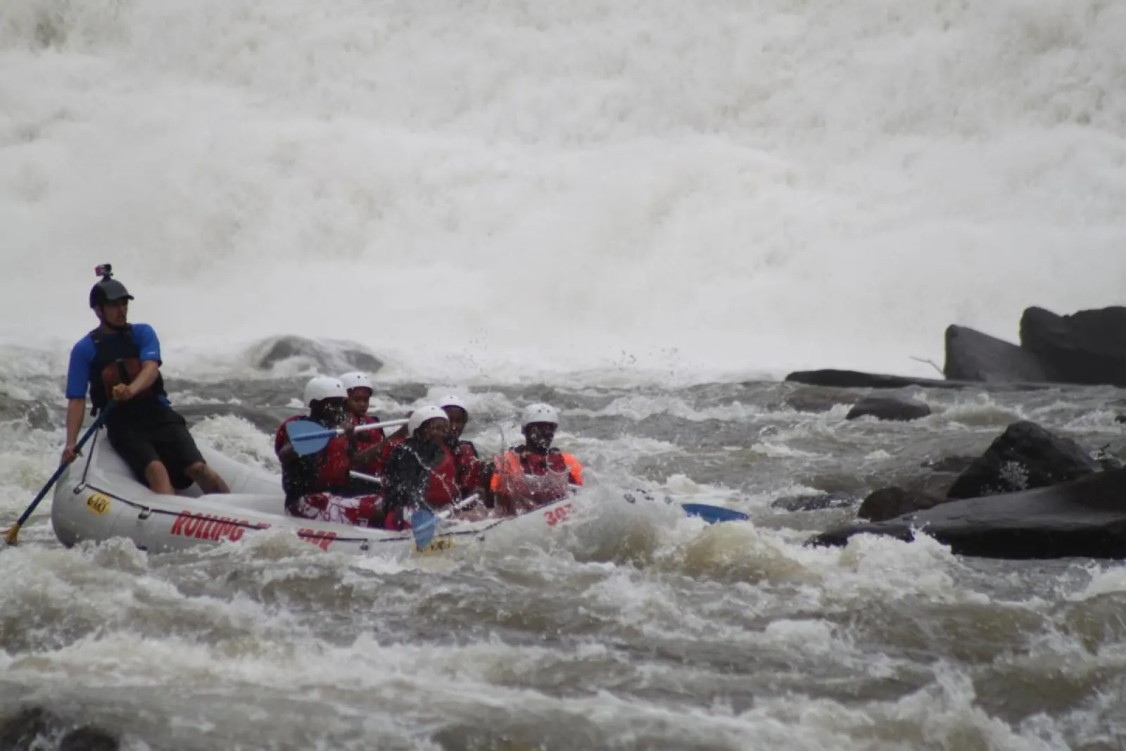 a group riding on the rapids