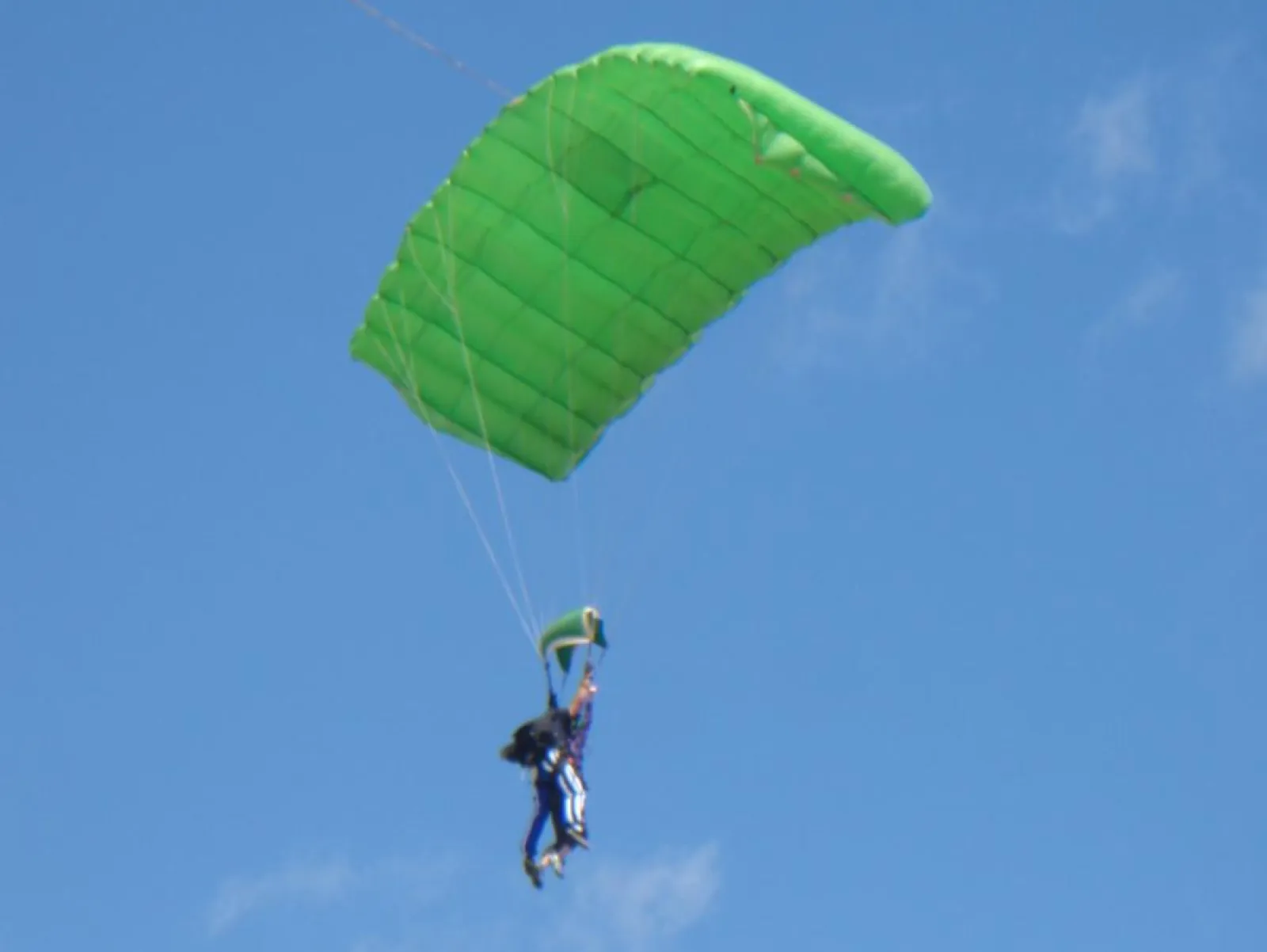 two people under a parachute