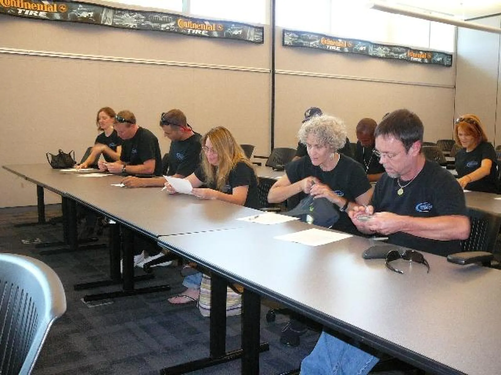 a group of people sitting at a table