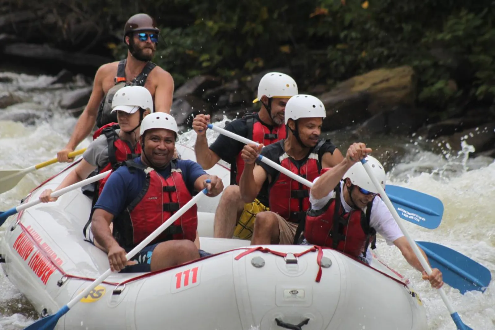 a group of people on a raft