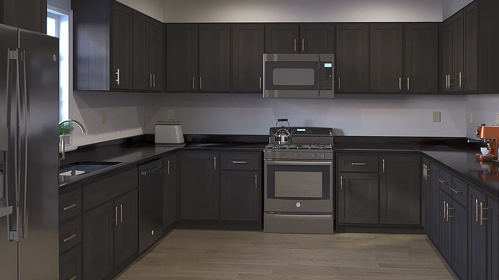 Modern kitchen with dark wood cabinets, stainless steel appliances, black countertops, and light hardwood flooring