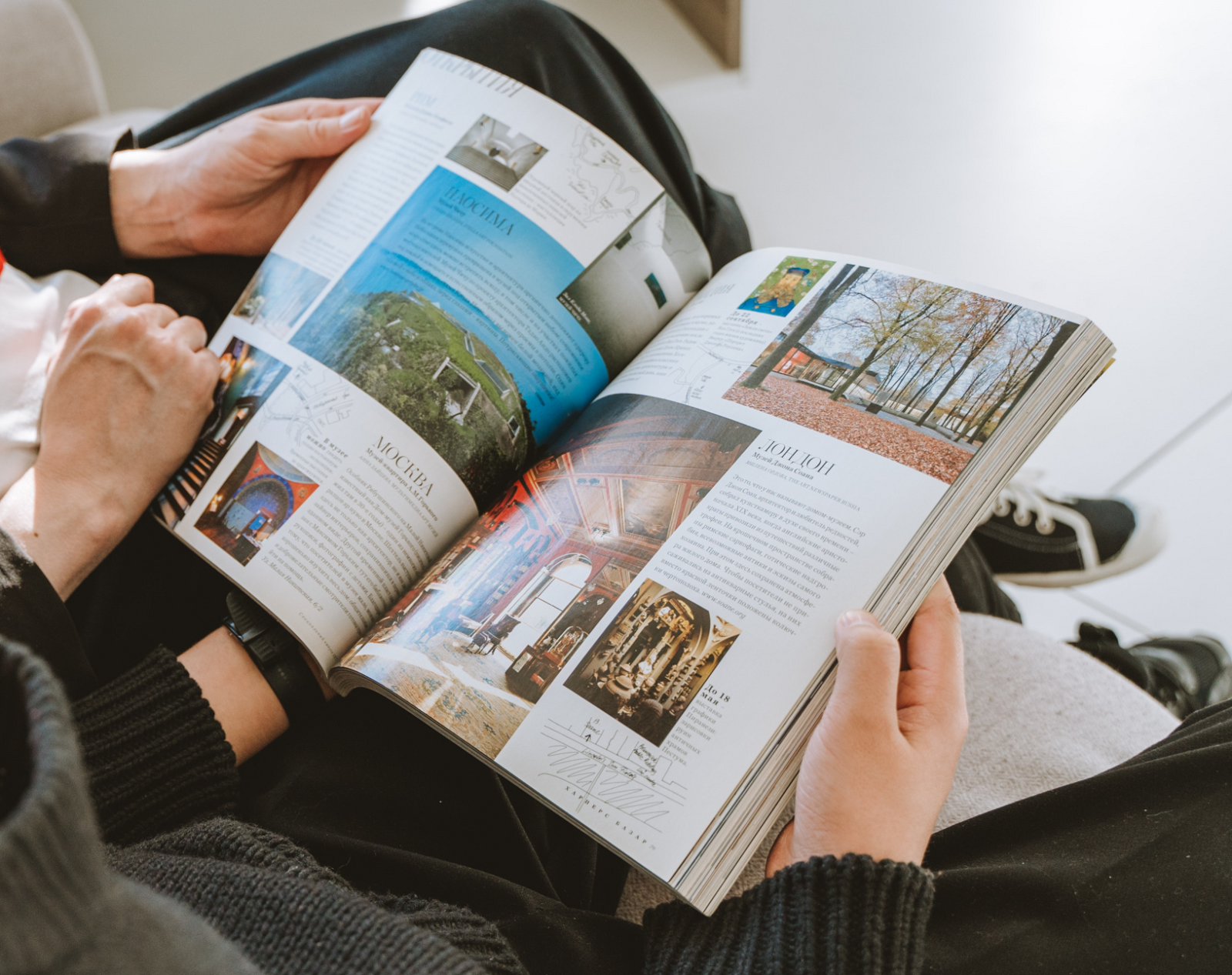 Two people reading a Catalog