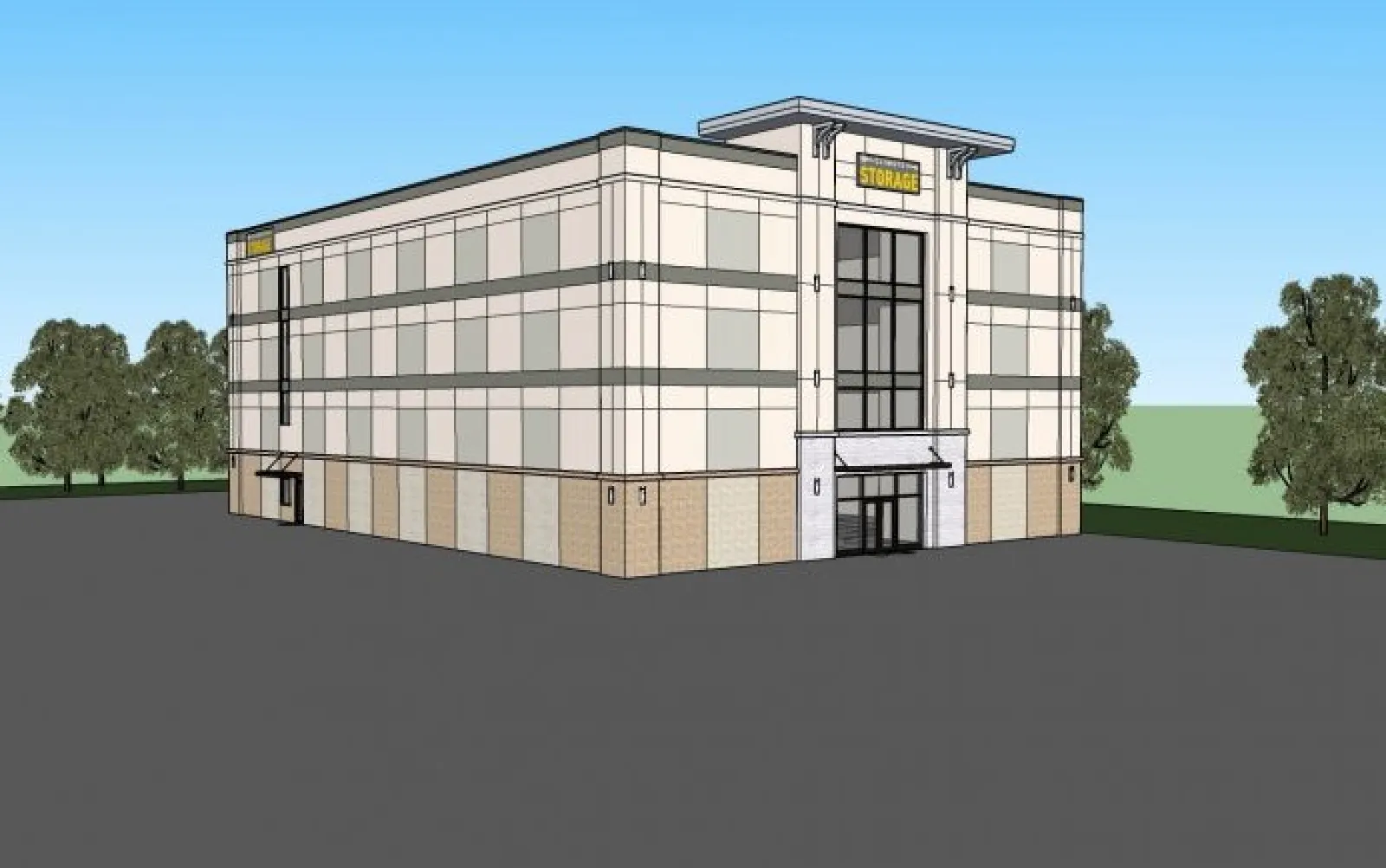 Modern three-story storage facility building with large windows and surrounding trees under a clear sky.