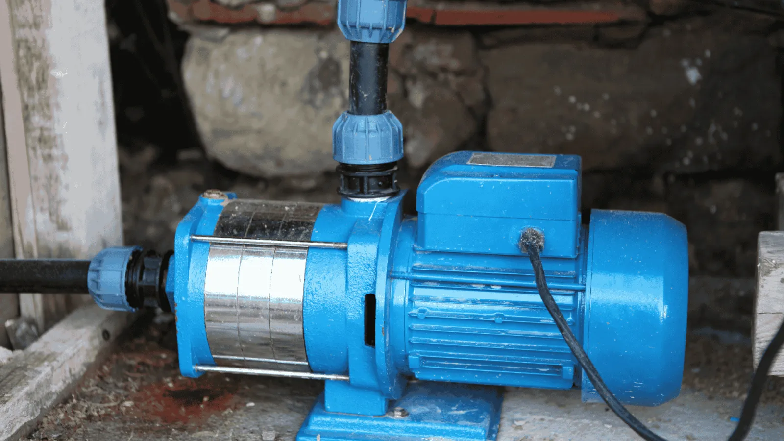 Diagram showing how a sump pump works in a basement