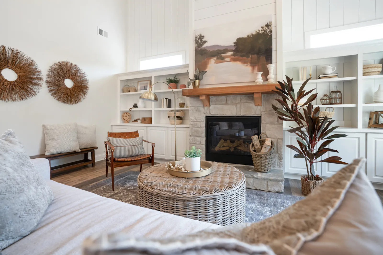 a living room with a fireplace