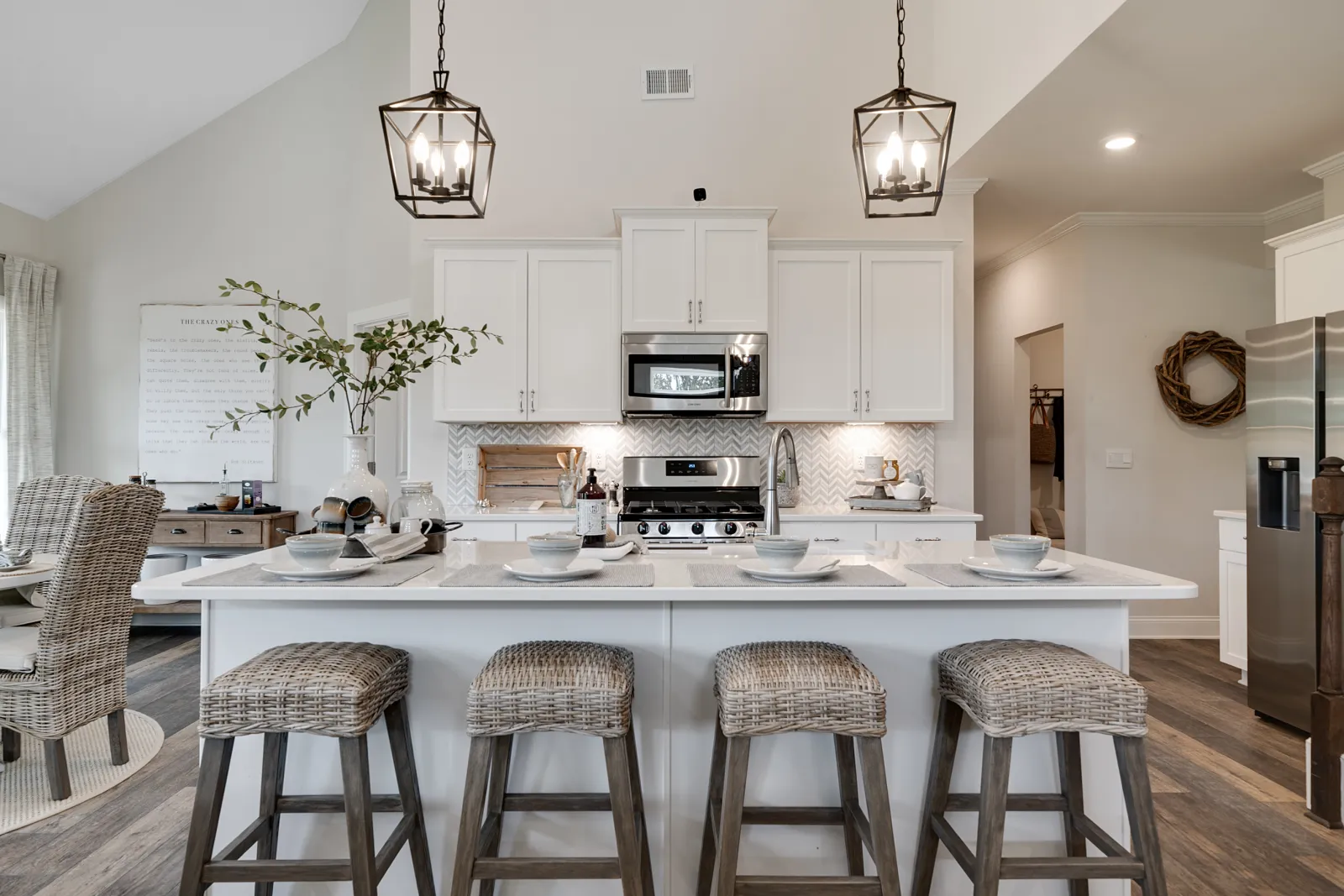 a kitchen with a table and chairs