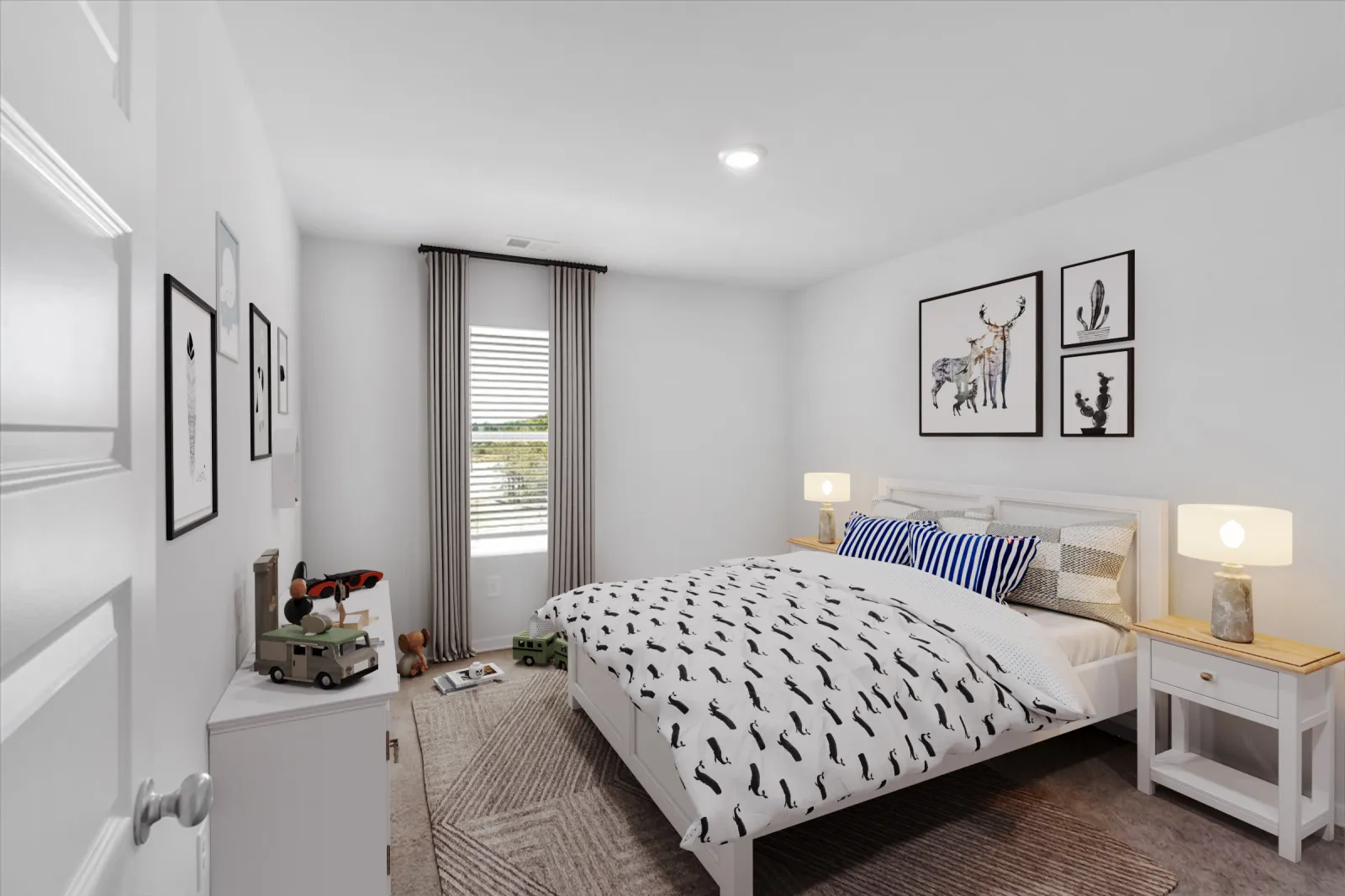 Bright bedroom with white furniture, patterned bedding, framed animal artwork, and soft lighting