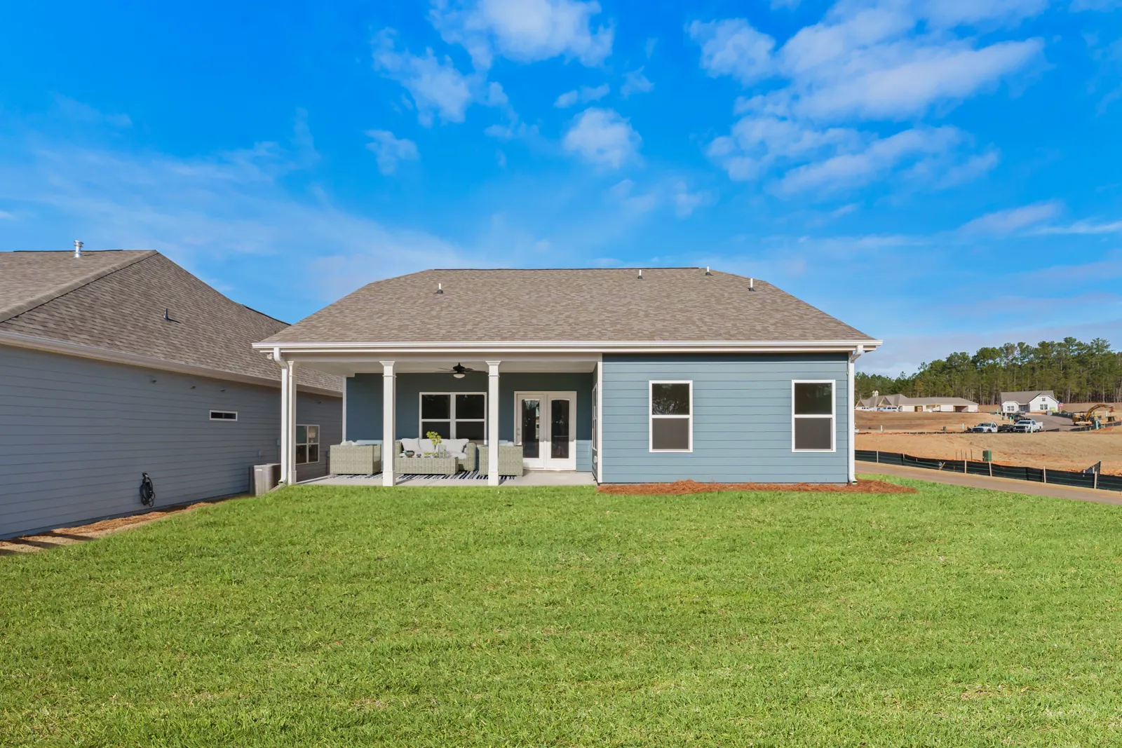 a house with a lawn in front of it