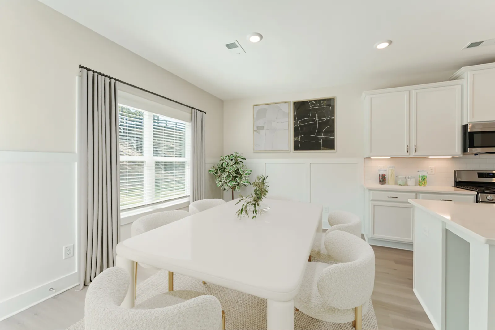 a kitchen with a dining table