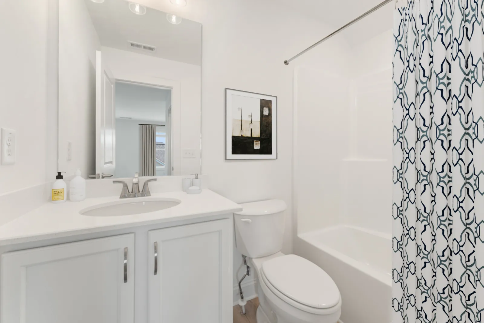 a bathroom with a sink toilet and bathtub