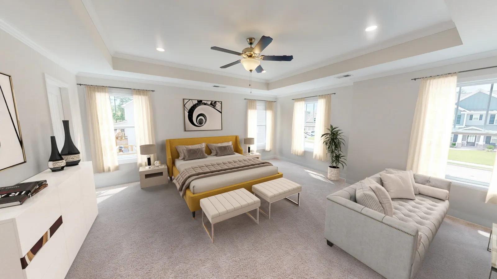 a living room with a couch and a fan