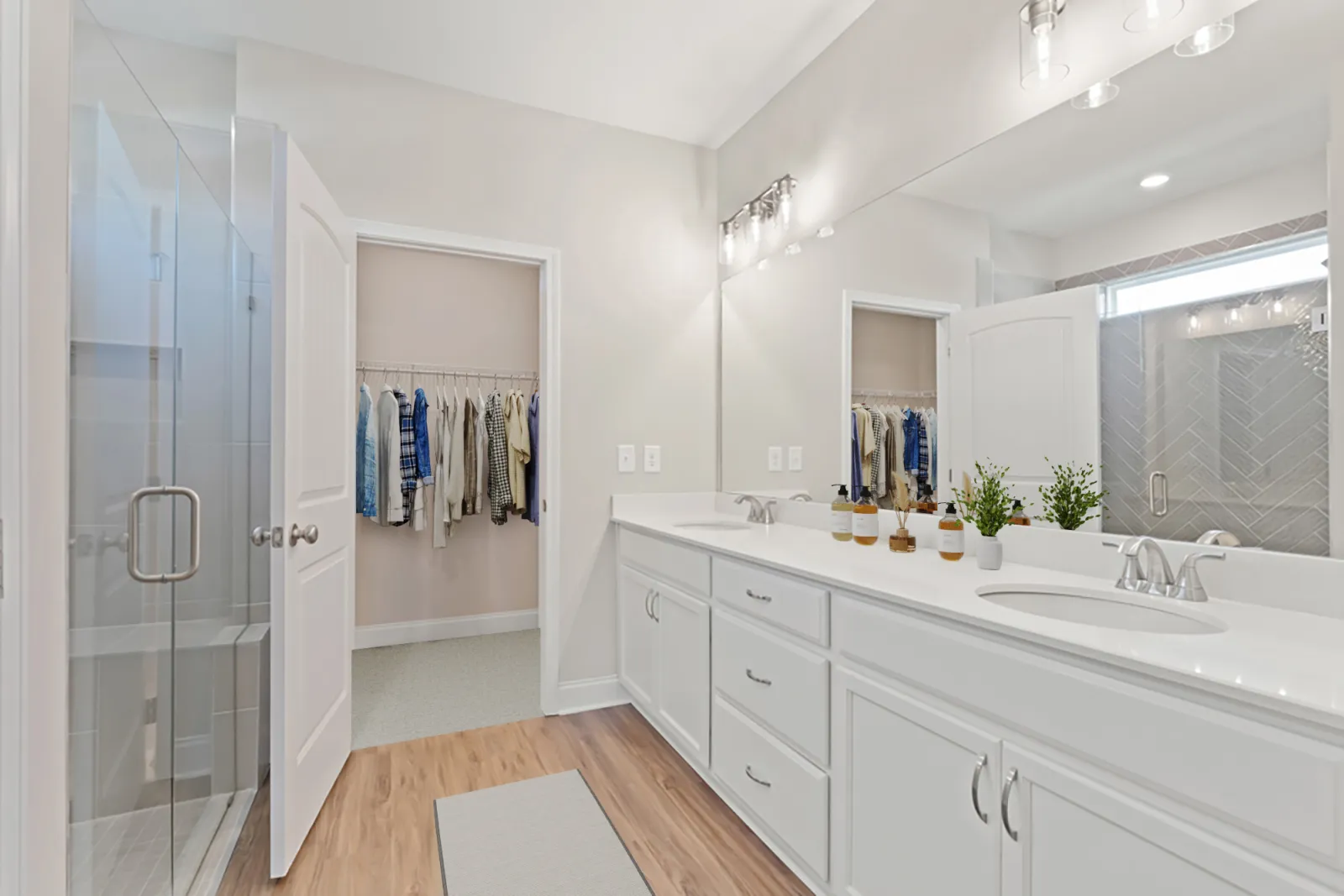 a bathroom with a sink and a shower unit