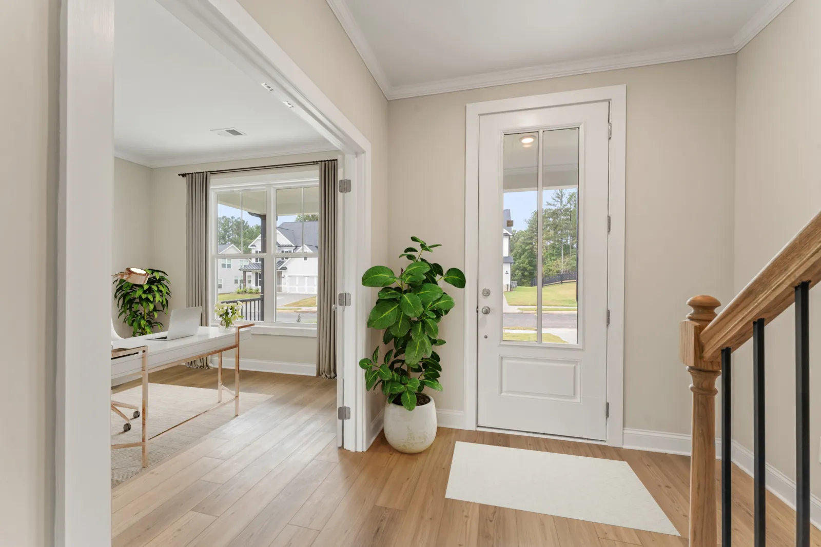 a room with a table and plants