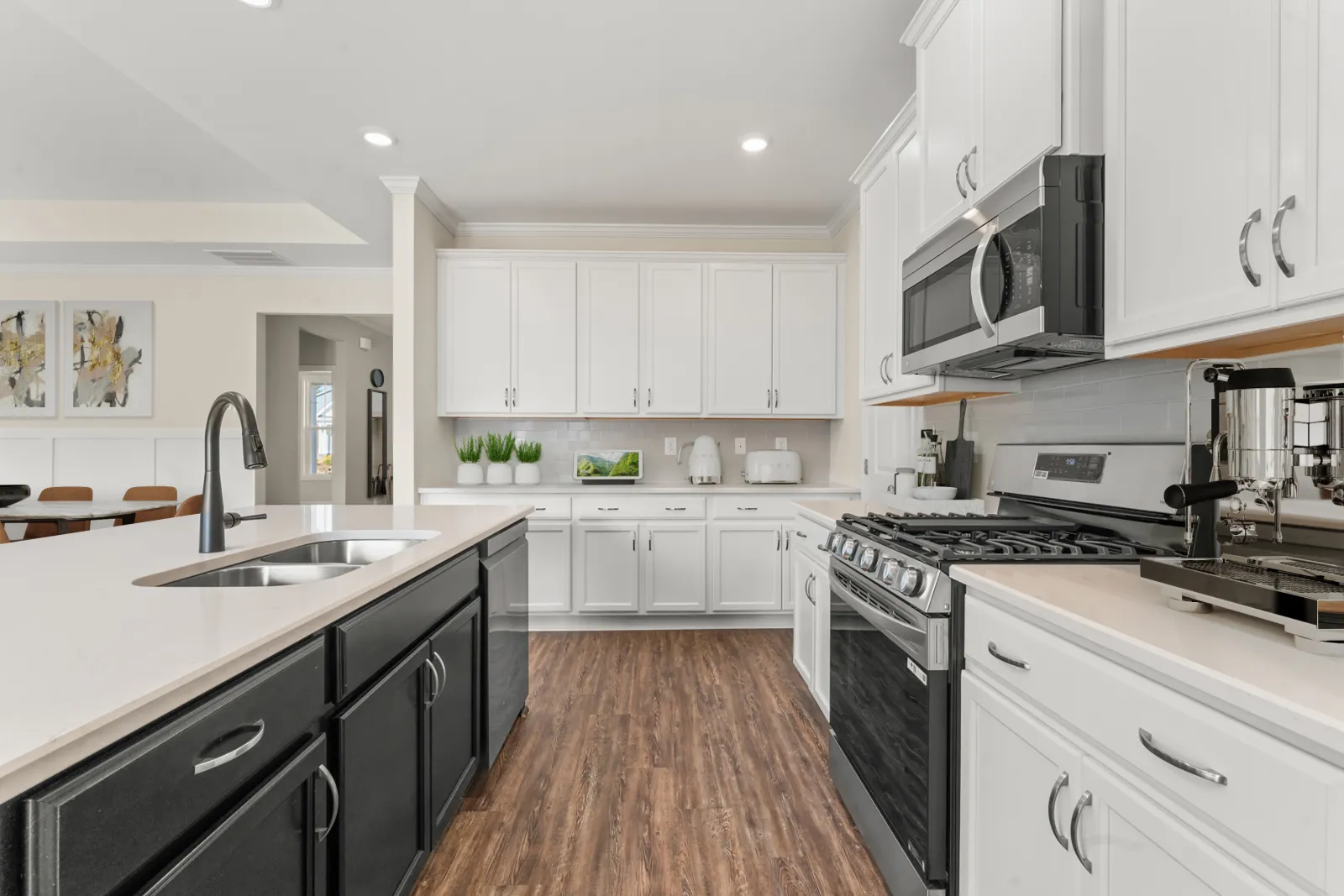 a kitchen with white cabinets