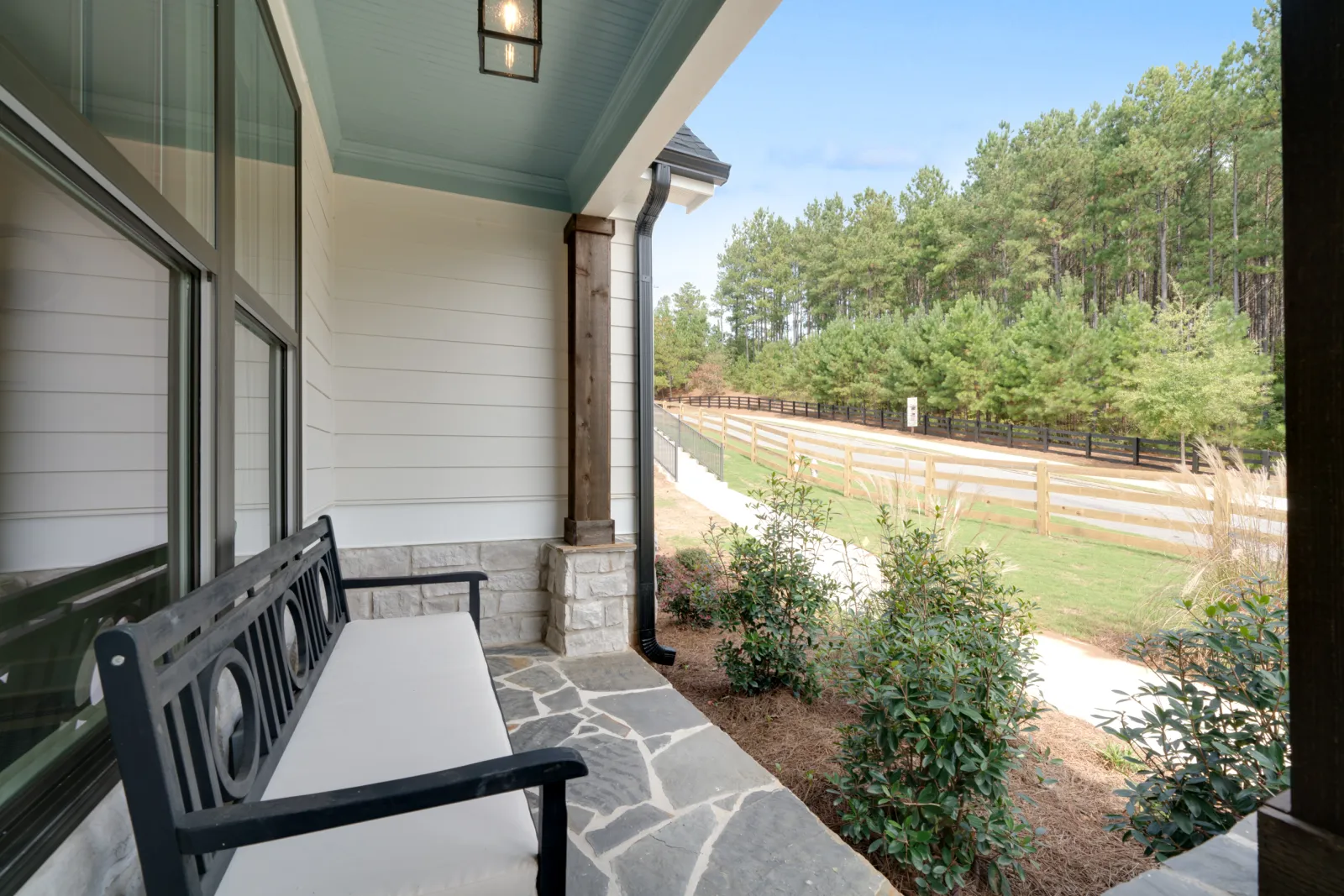 a patio with a table and chairs