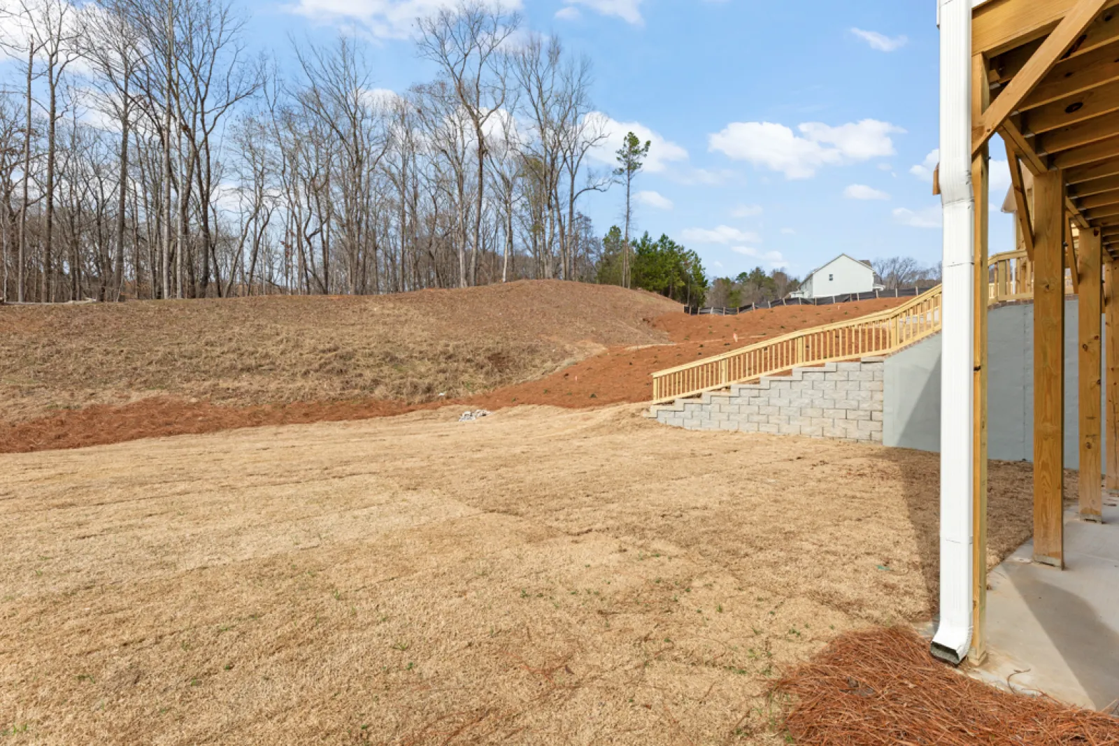 a dirt hill with a building on it