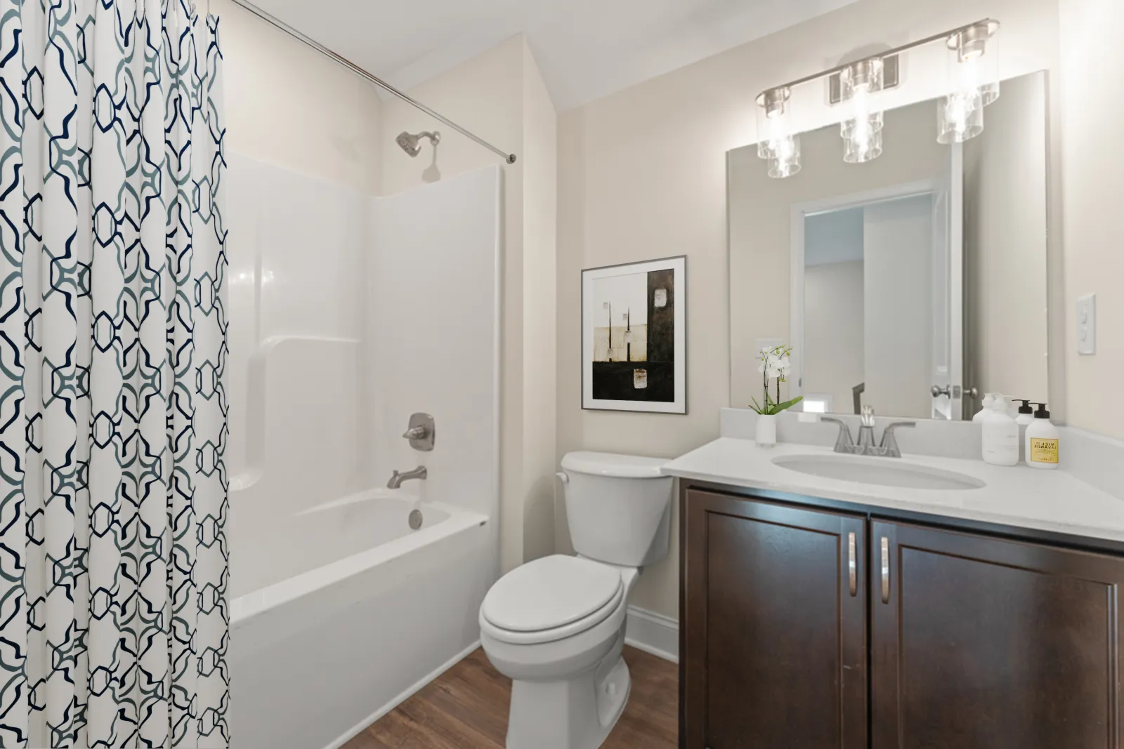 a bathroom with a tub sink and toilet