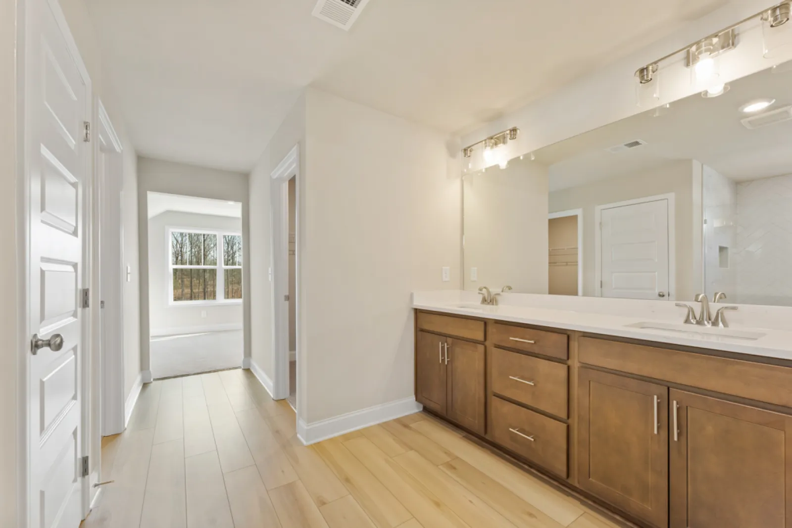 a bathroom with a large mirror