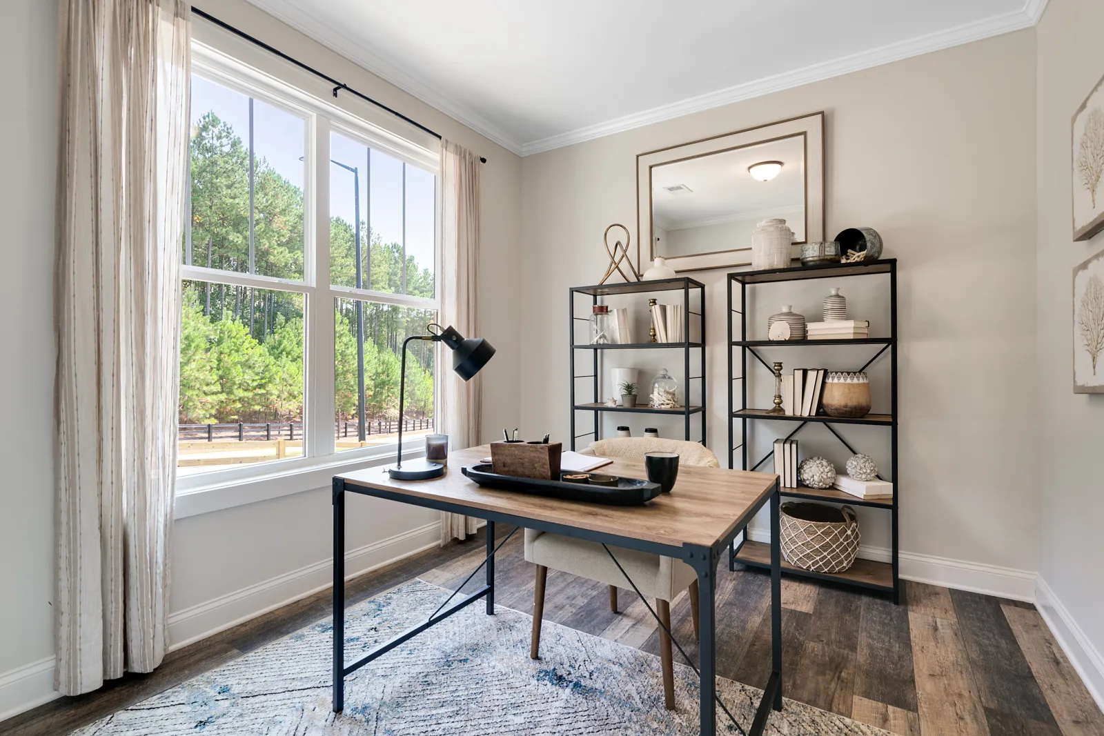 a room with a table and shelves