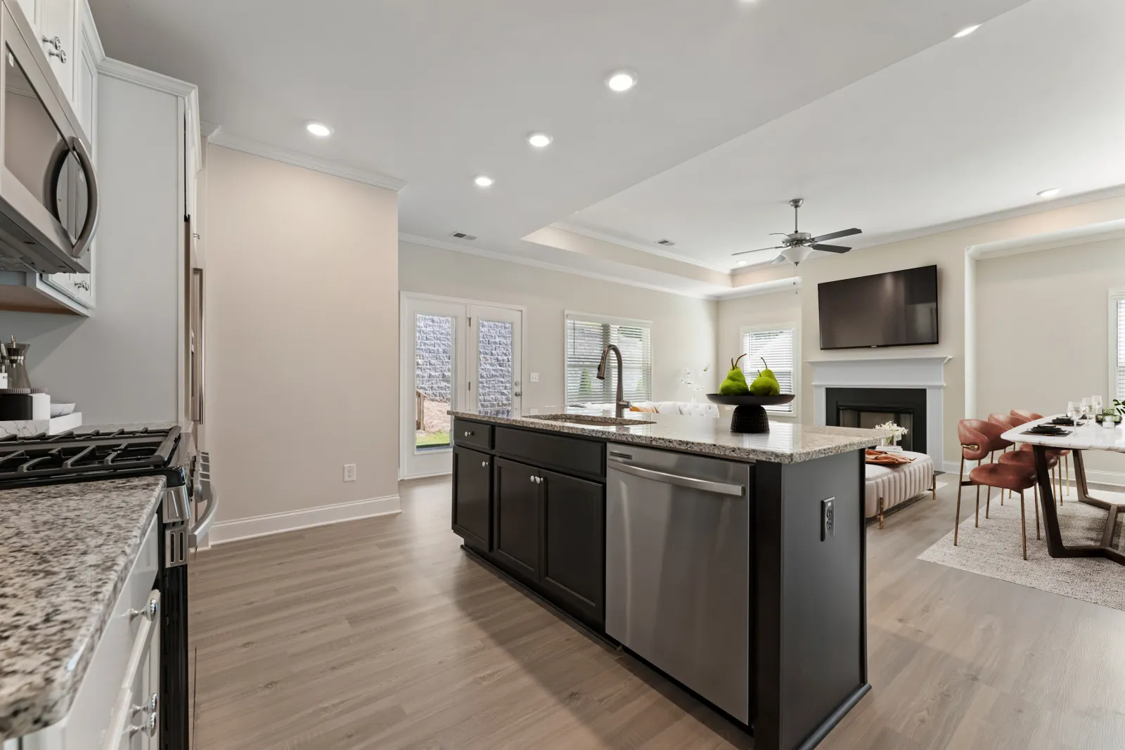 a kitchen with black appliances