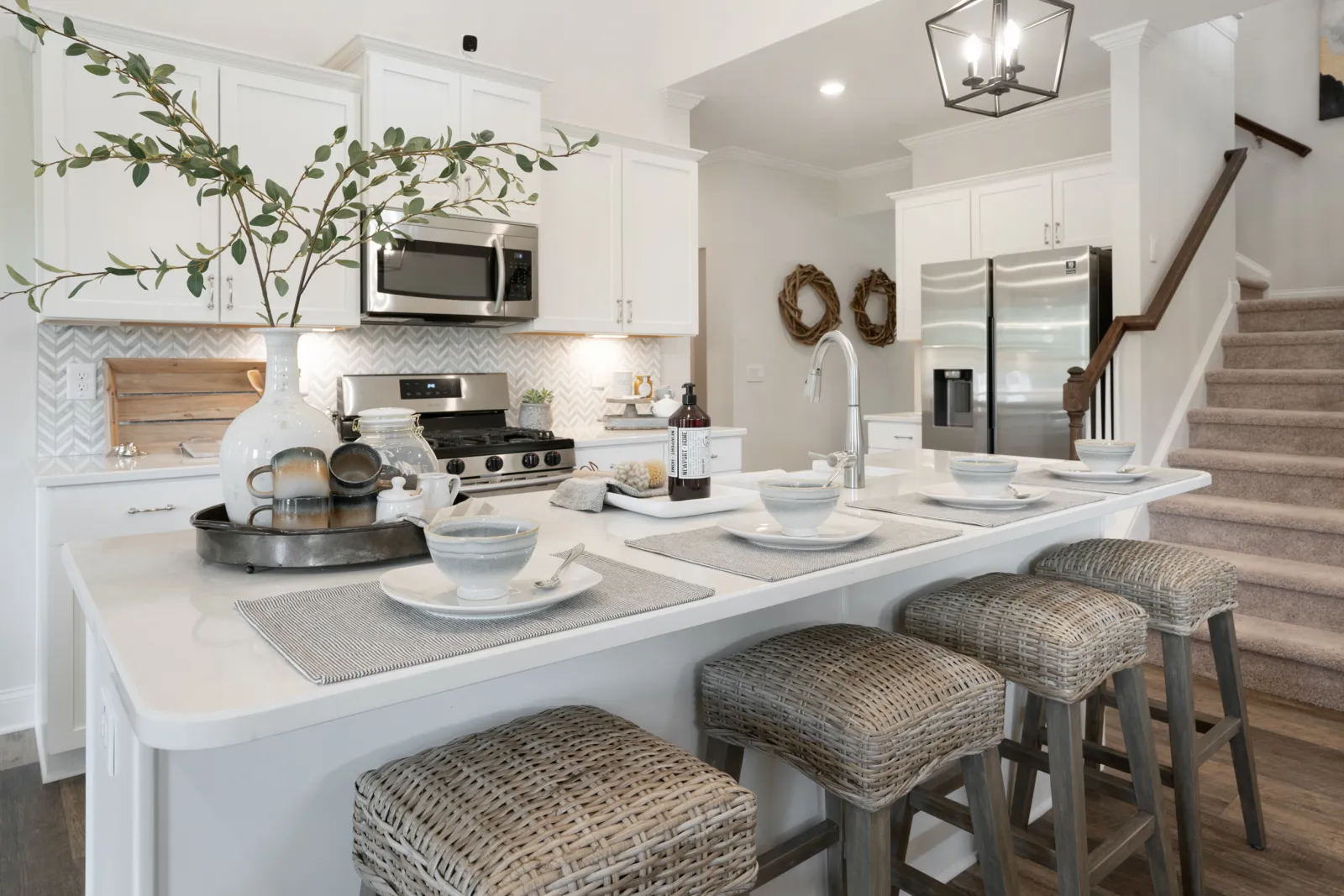 a kitchen with a white counter top