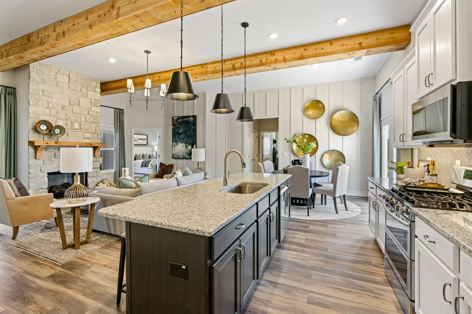 a kitchen with a marble island