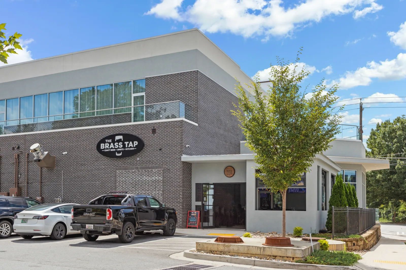 a building with cars parked outside