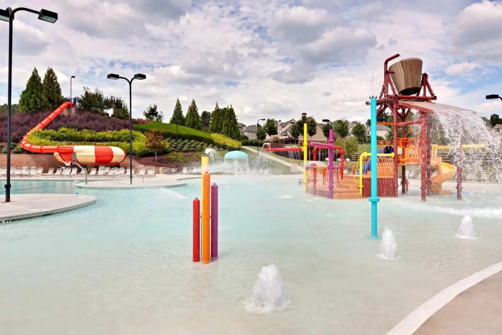 lots of water play areas at the community pool