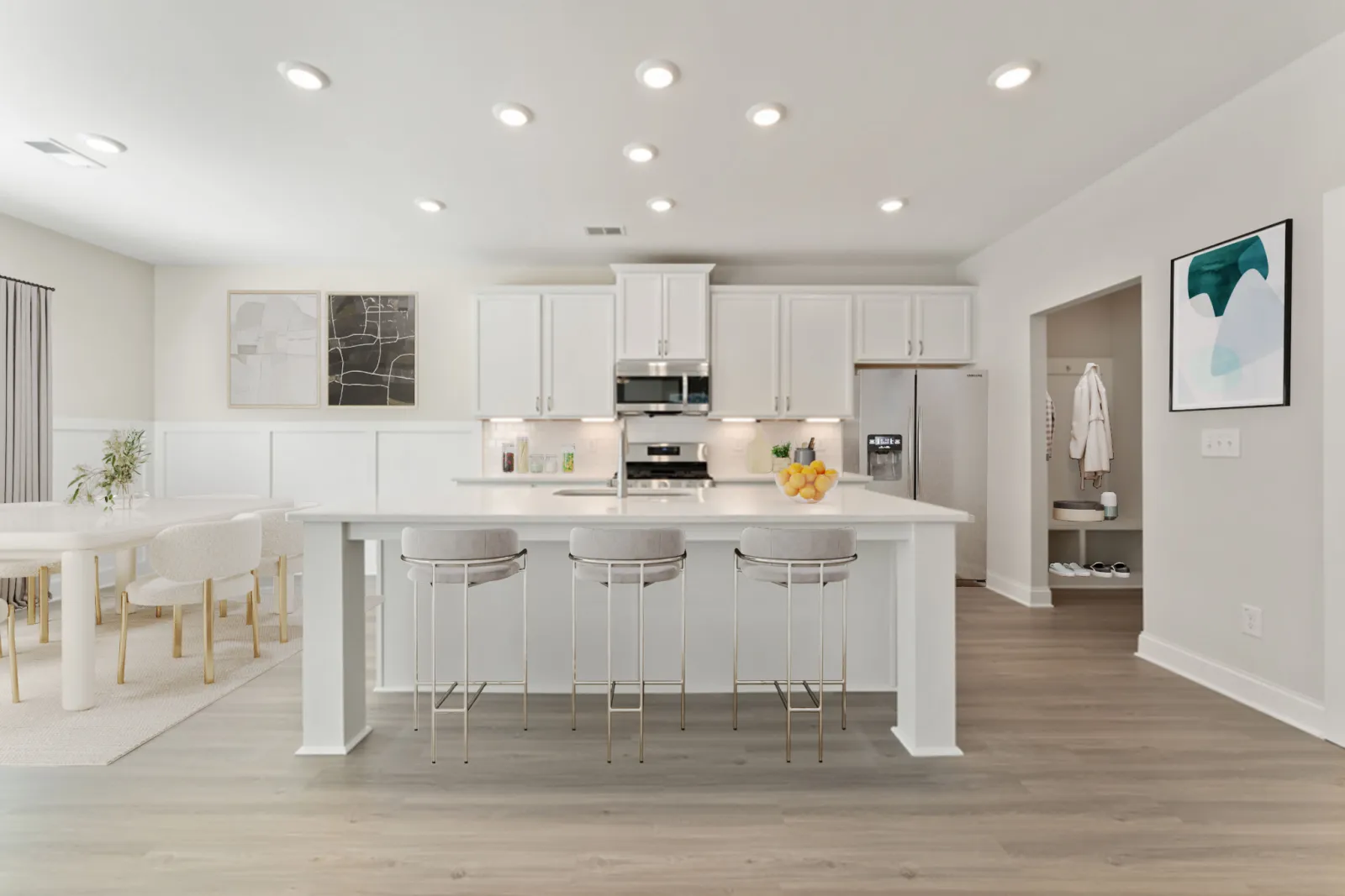 a kitchen with white cabinets