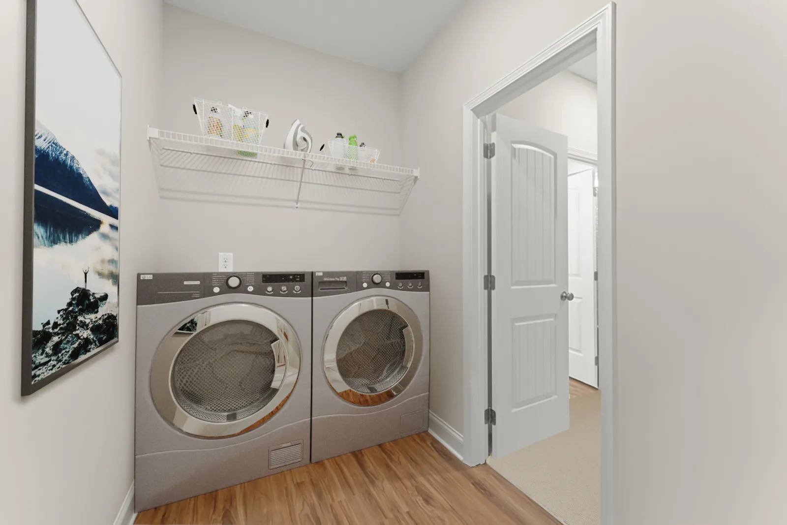 a room with a washing machine and a door