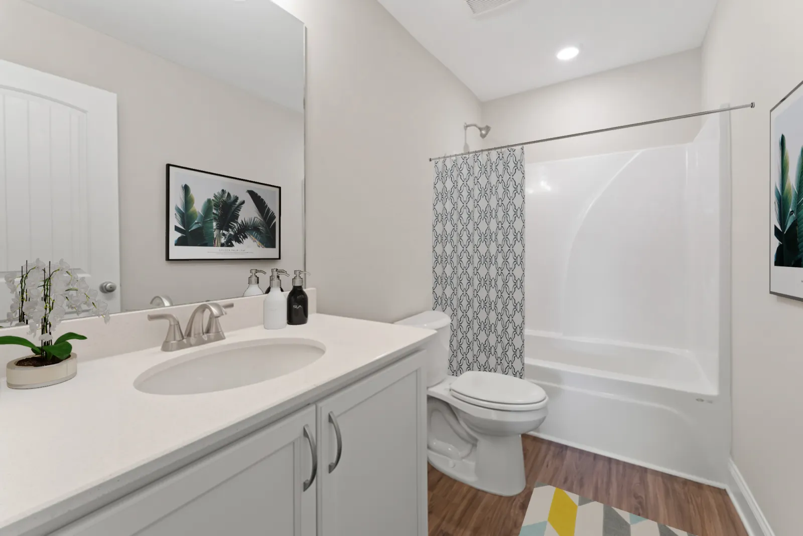 a bathroom with a tub sink and toilet