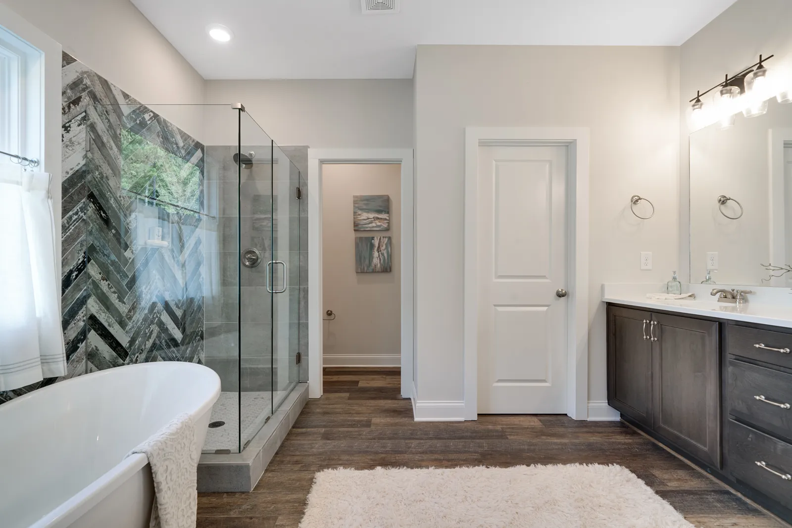 a bathroom with a glass shower