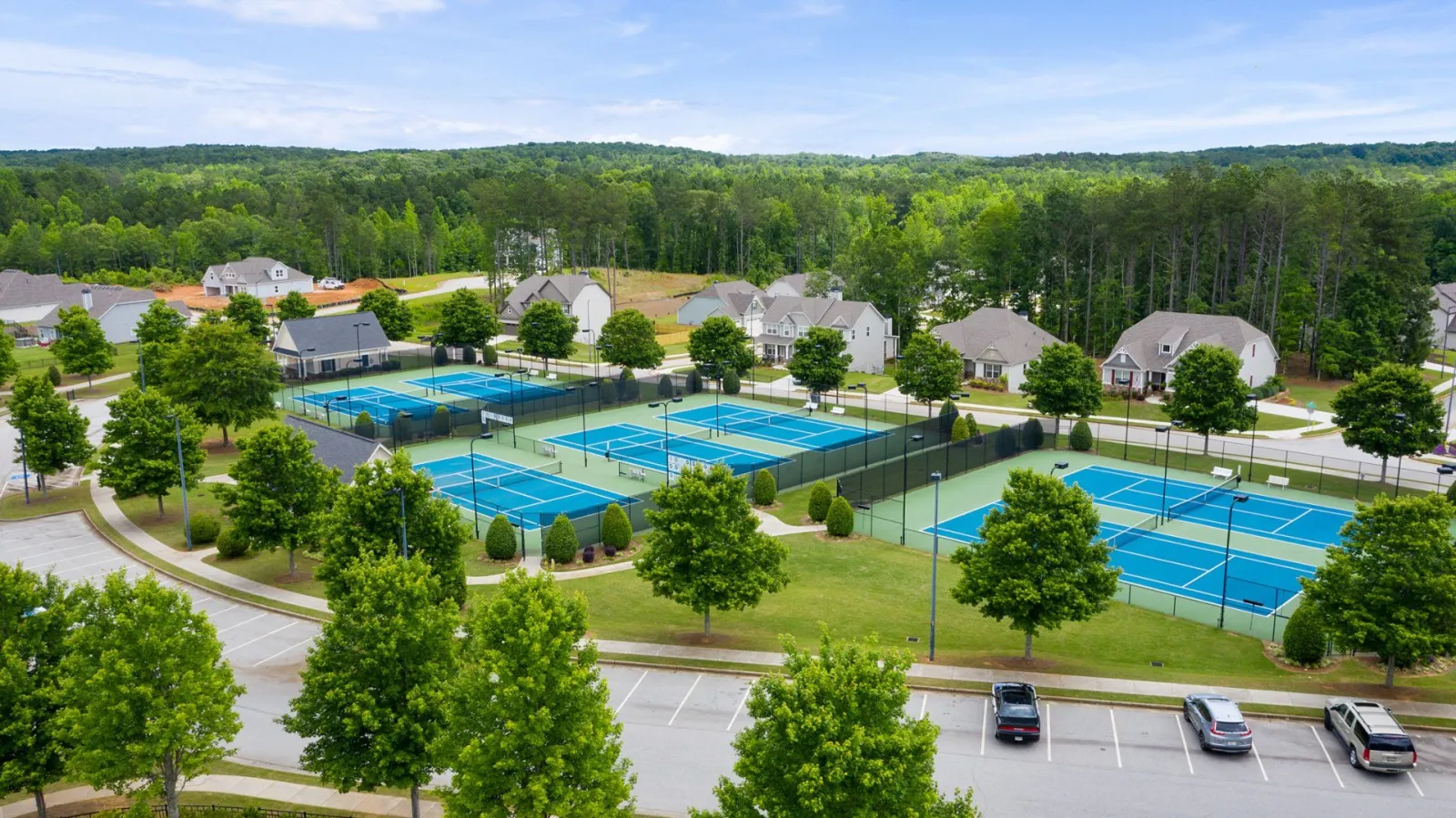an overhead view of the tennis courts at The Georgian