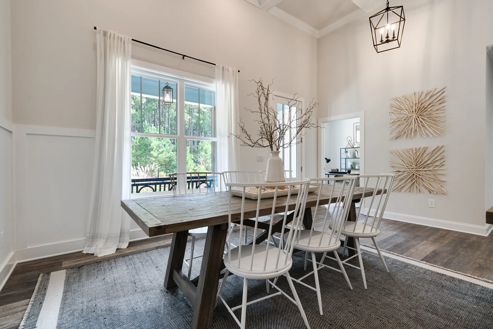 a dining room table with chairs around it