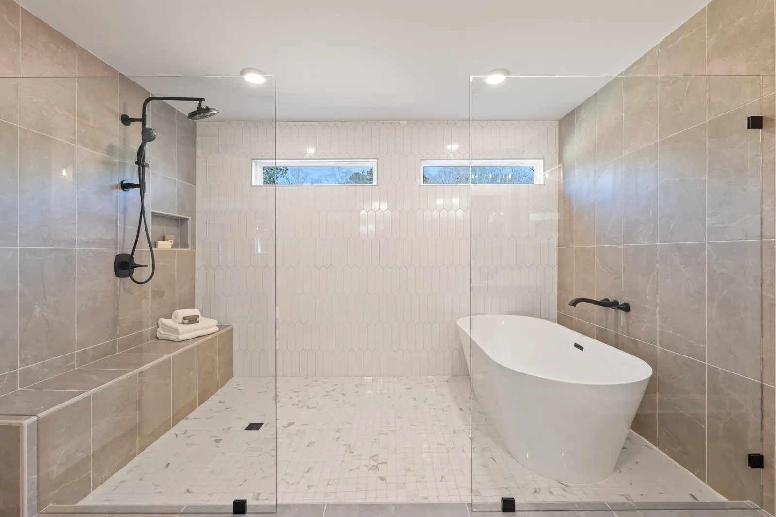 a bathroom with a bathtub and toilet