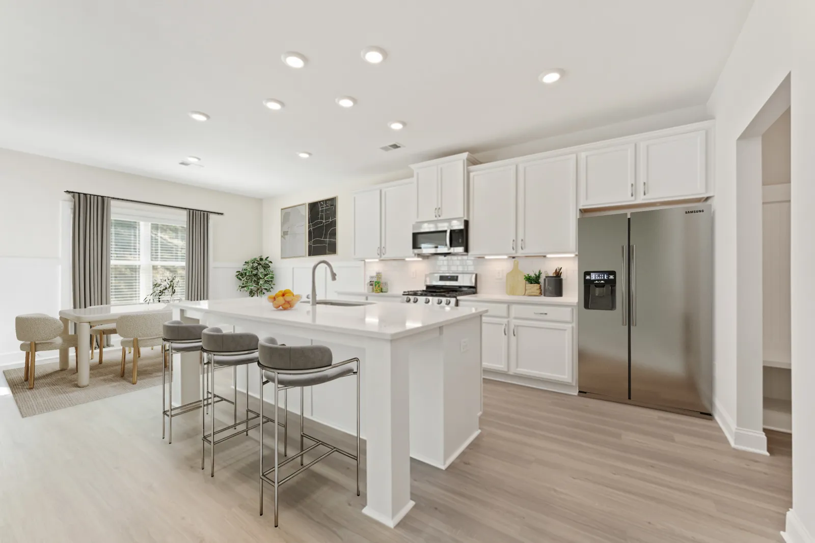 a kitchen with white cabinets