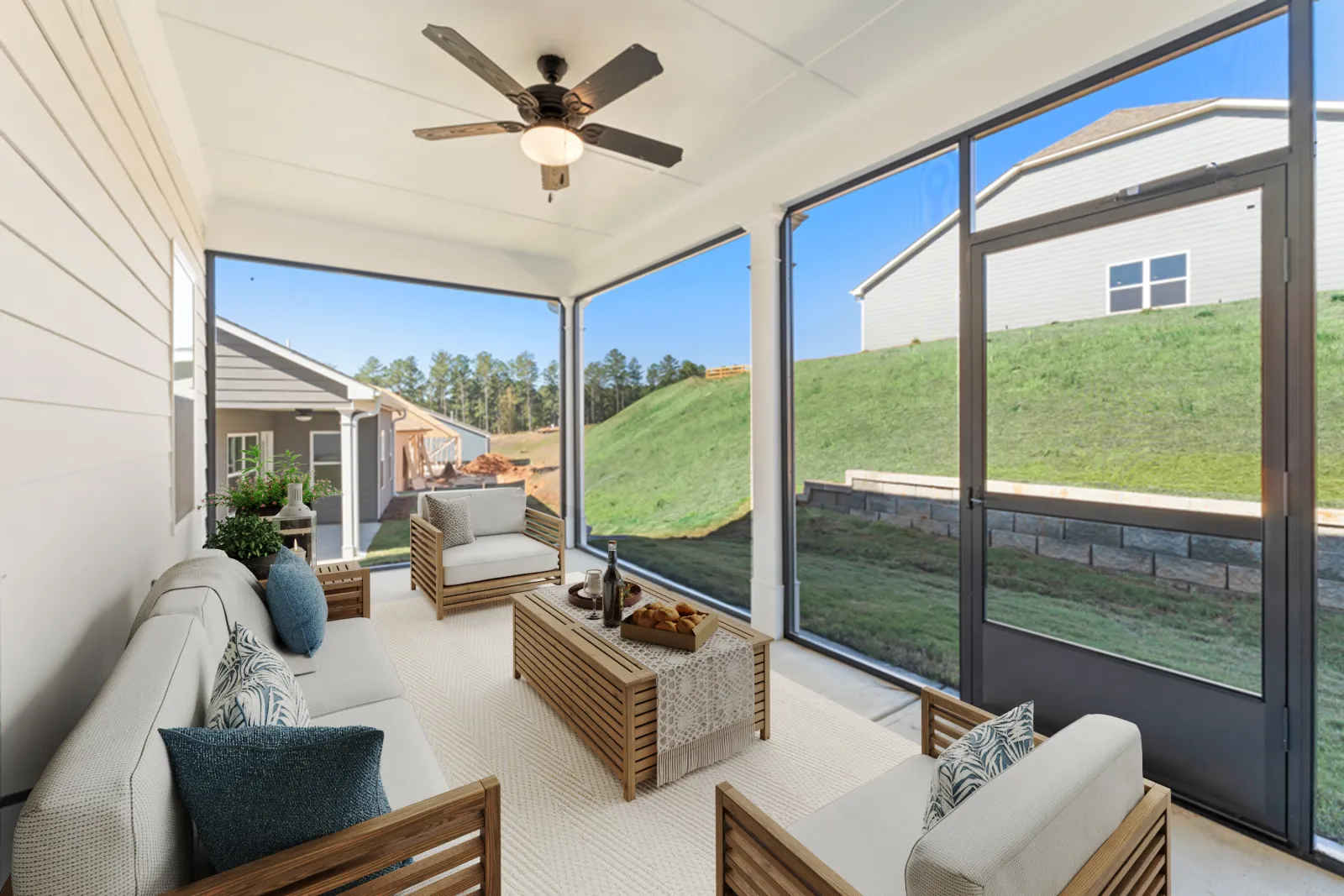 a living room with a large glass door