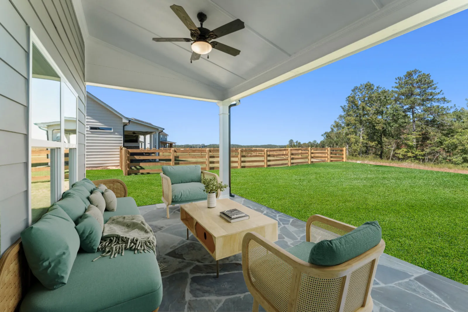 a living room with a green lawn