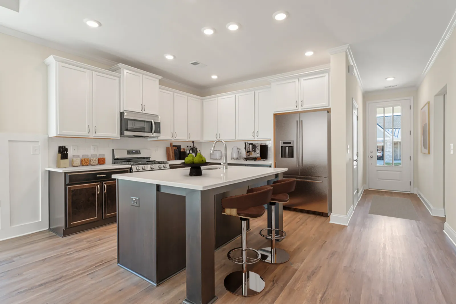 a kitchen with white cabinets