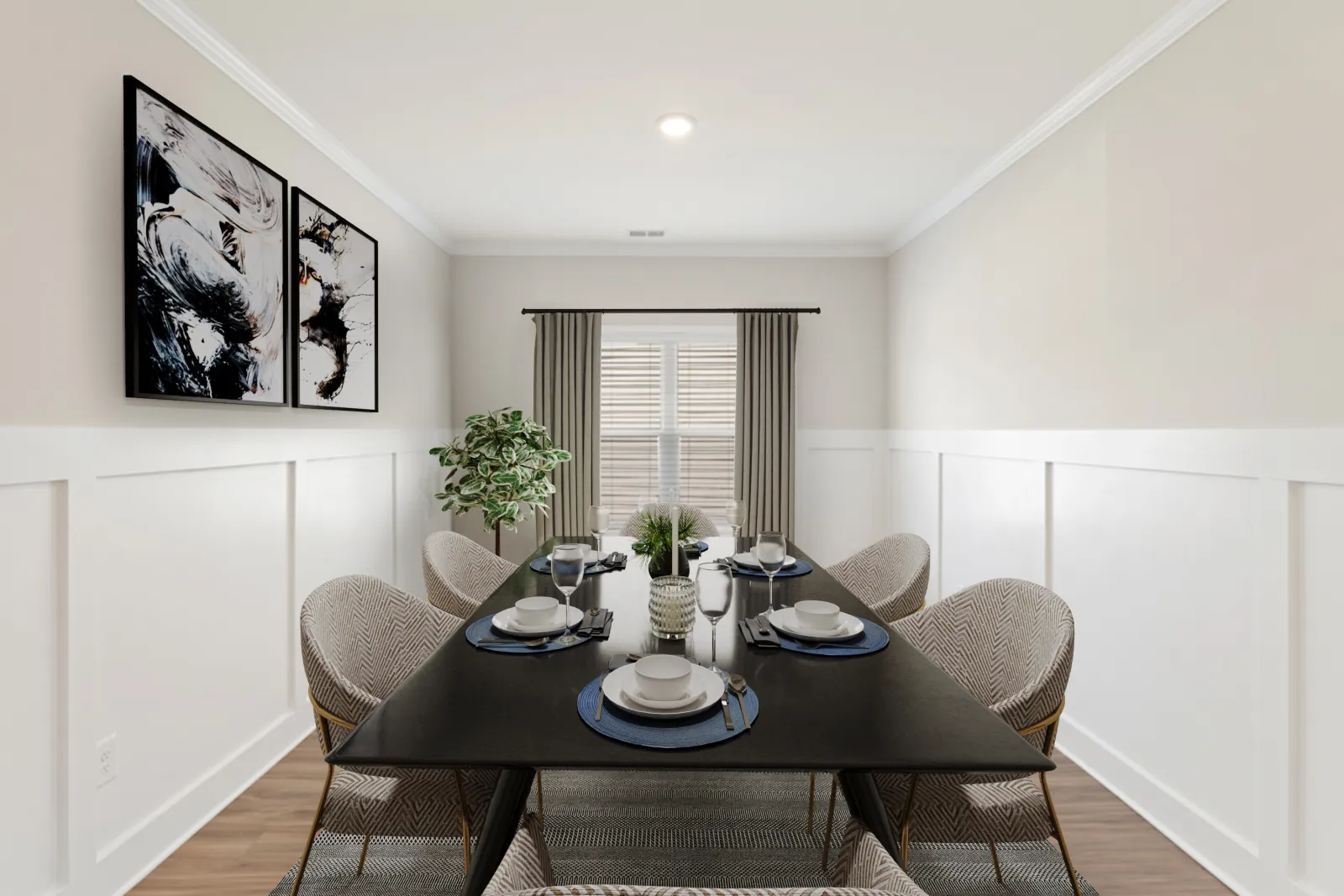 a dining room table with a plant on it