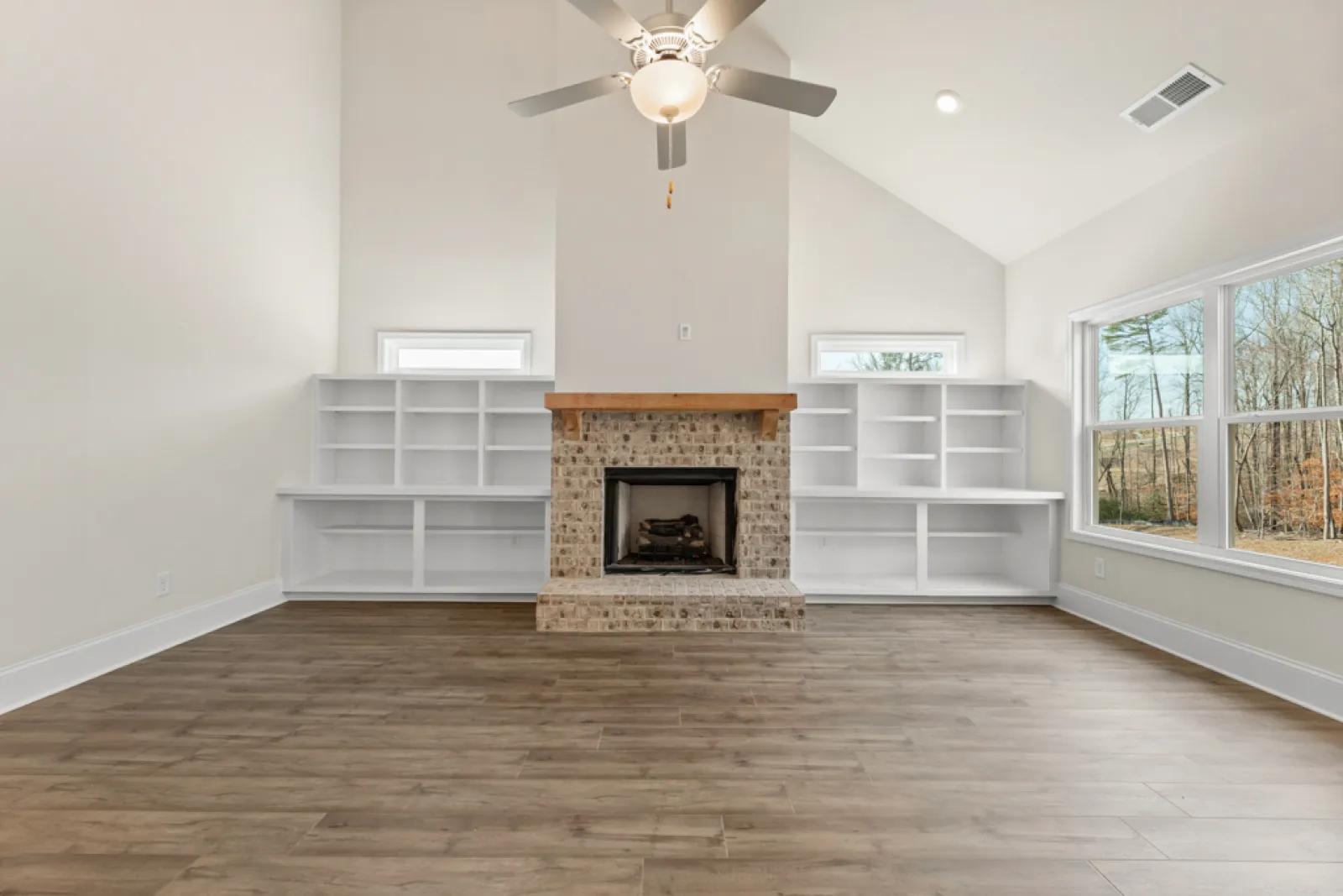 a living room with a fireplace